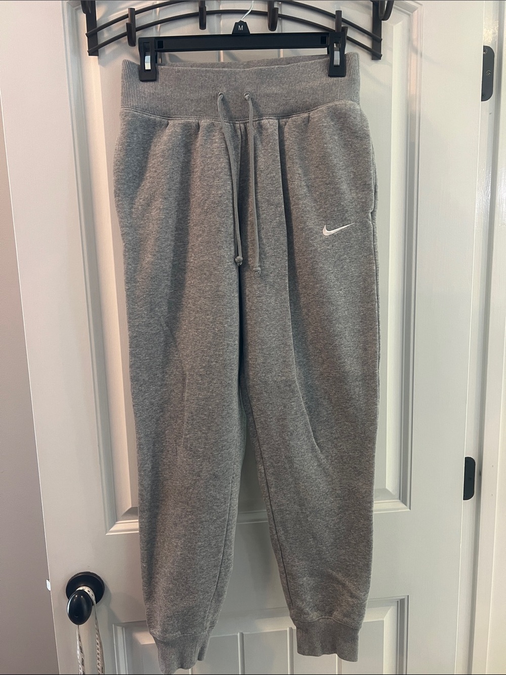 Nike Gray women’s Sweatpants with White Swoosh